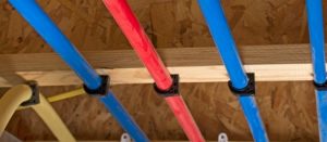 PEX piping installed onto a ceiling.